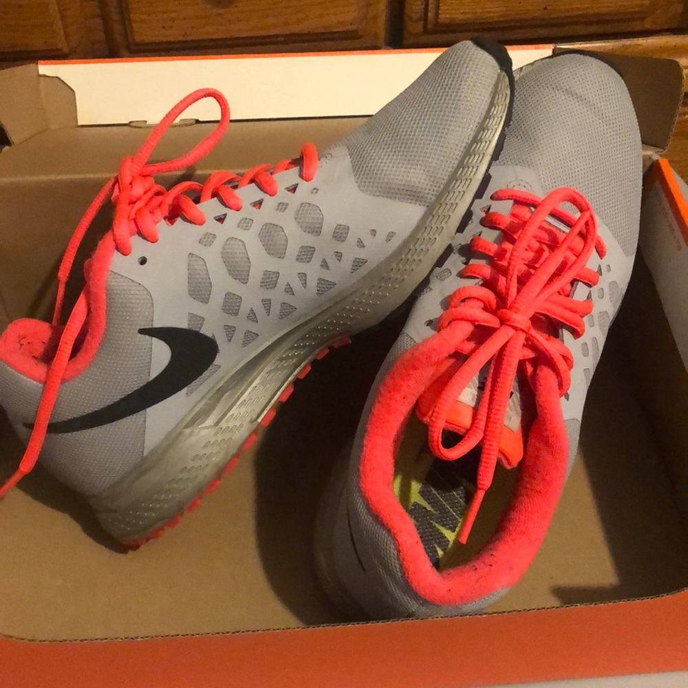 Gray and hot pink Nikes